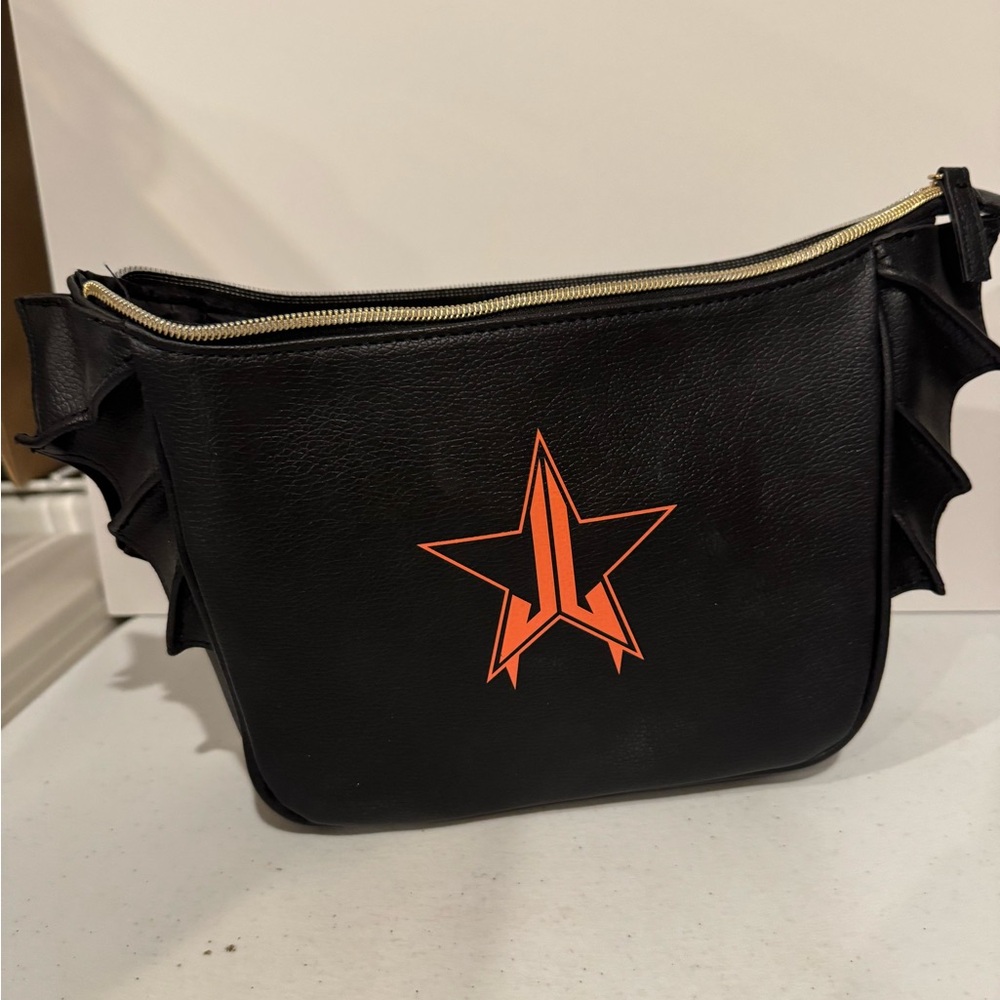 Jeffrey Star Black Bag with Orange Star Design